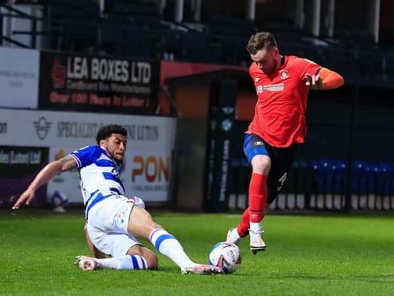 Ryan Tunnicliffe tries to get away from his man during last night's 0-0 draw with Reading