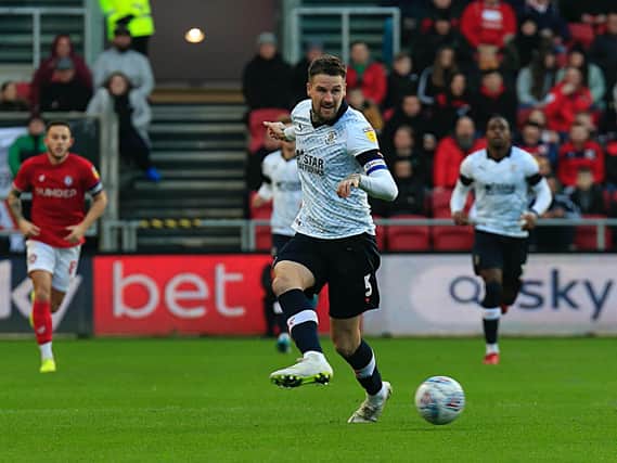 Sonny Bradley plays the ball back during Luton's 3-0 defeat at Bristol City last season