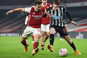 Newcastle United midfielder Elliot Anderson in action against Arsenal during the Magpies FA Cup defeat