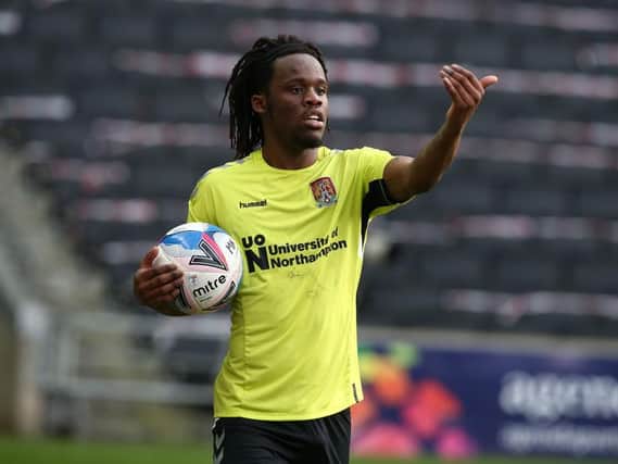 Town defender Peter Kioso during his loan spell with Northampton