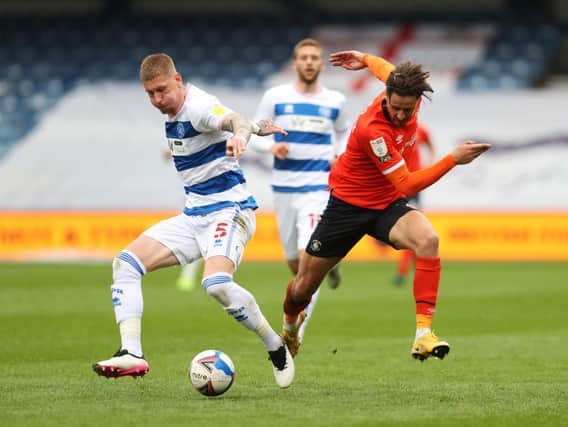 Harry Cornick tries to race away against Derby County this afternoon