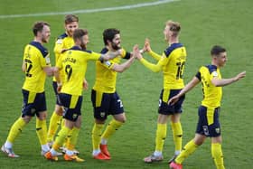 Elliot Lee celebrates a goal for Oxford United