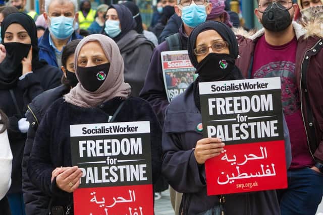 Protesters call for the recognition of a Palestinian state