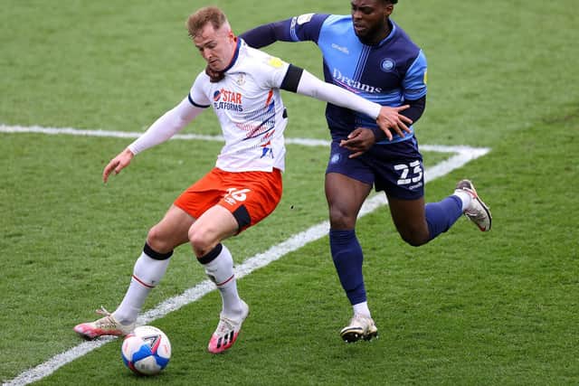 Fred Onyedinma in action for Wycombe against Luton Town in April