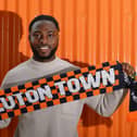 Fred Onyedinma signs for the Hatters
