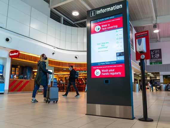 Digital kiosks give information to help passengers move around the airport