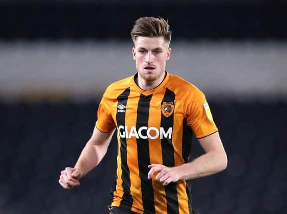 Hull defender Reece Burke has agreed to join Luton