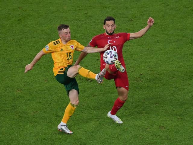 Joe Morrell wins possession against Turkey for Wales this evening