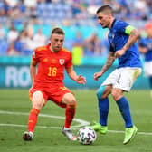 Joe Morrell gets close to Italy's Marco Verratti during yesterday's Euro 2020 clash