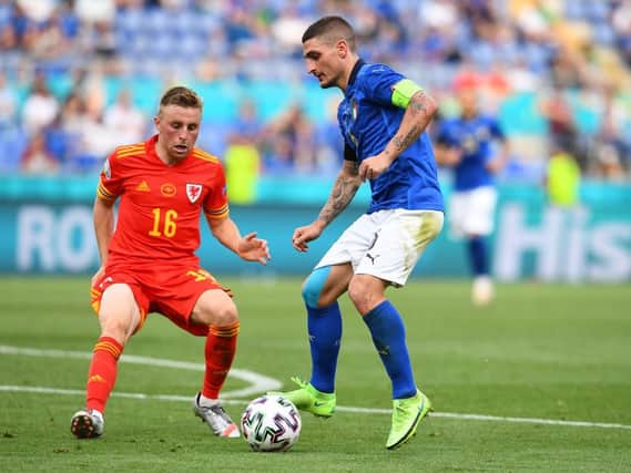 Joe Morrell gets close to Italy's Marco Verratti during yesterday's Euro 2020 clash