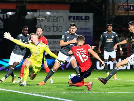 Tom Lockyer goes close for Luton in their Carabao Cup clash against Manchester United last season