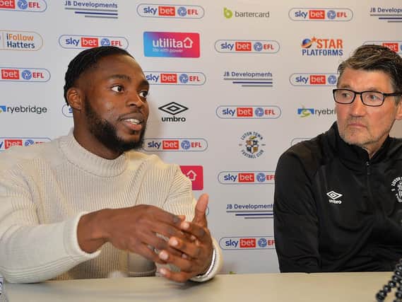 Town attacker Fred Onyedinma with Luton assistant boss Mick Harford