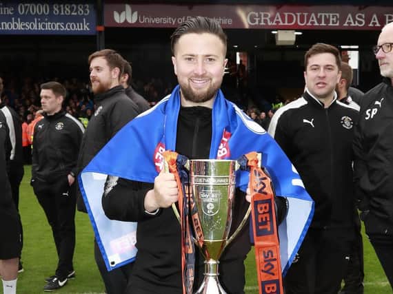 Jared Roberts-Smith celebrates winning promotion from League Two in 2018