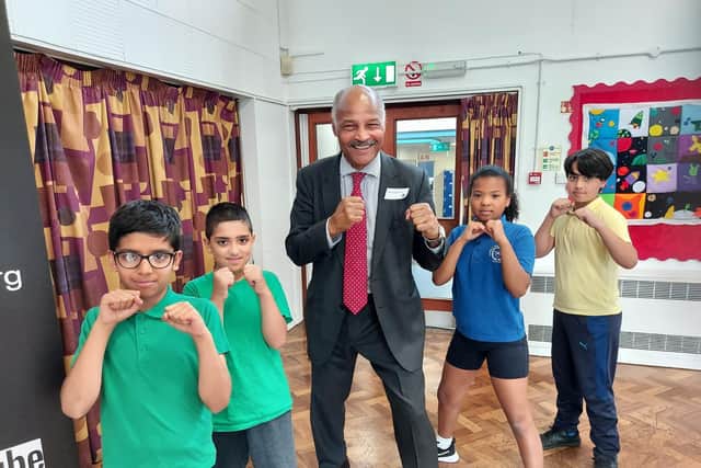 Boxing legend John Conteh with Icknield High School pupils