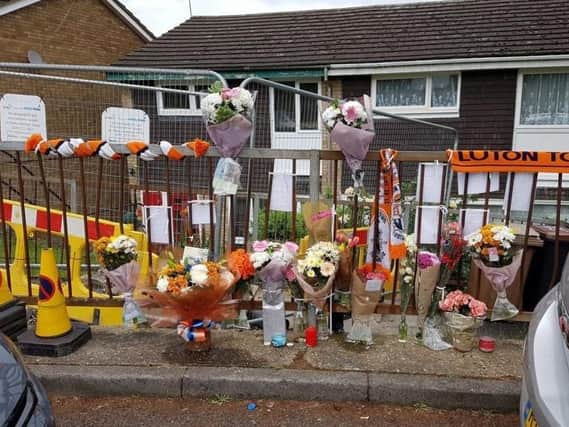 Tributes were left at the scene on Devon Road