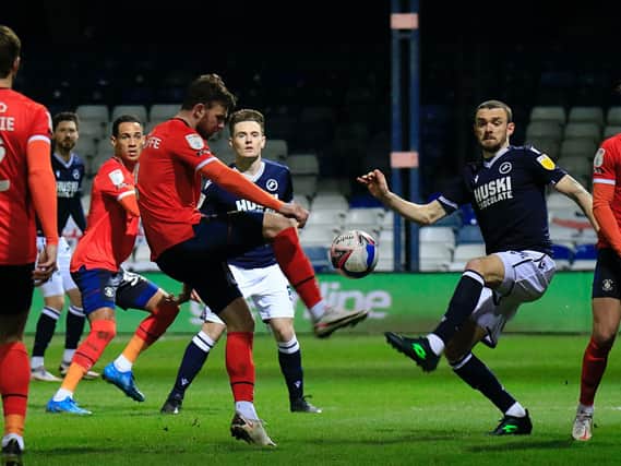 Former Town midfielder Ryan Tunnicliffe in action against his old club Millwall