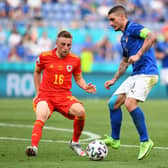 Joe Morrell in action for Wales against Italy at the Euros