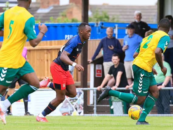 Carlos Mendes Gomes gets forward against Hitchin Town on Saturday