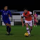 Town defender Corey Panter in action