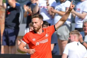 Jordan Clark celebrates his second goal against Boreham Wood on Saturday