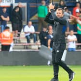 Nathan Jones applauds the Luton fans after Saturday's draw with Portsmouth (Picture: Liam Smith)