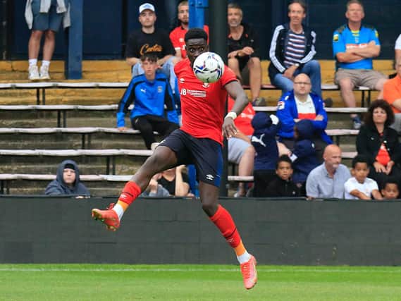 Elijah Adebayo keeps a close eye on the ball during Saturday's 1-1 draw with Portsmouth (Picture: Liam Smith)