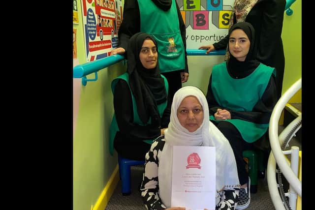 Proud staff at Leo Cubs Nursery with their certificate