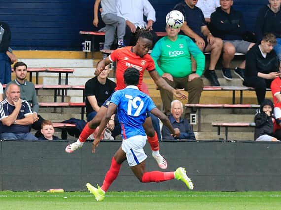 Town defender Peter Kioso in action against Portsmouth recently