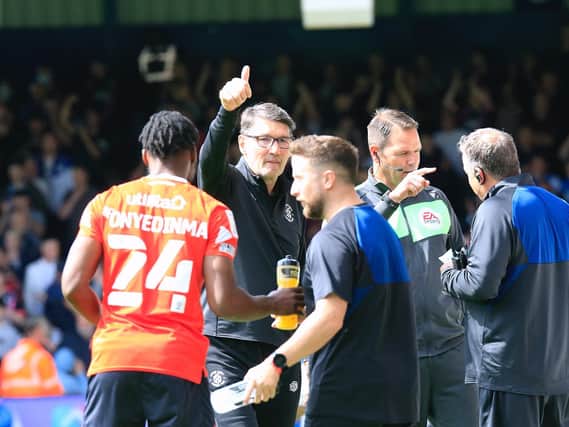 Mick Harford gives Luton supporters the thumbs up at the weekend