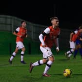 Town midfielder Jake Peck