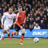 Flynn Downes in action for Luton