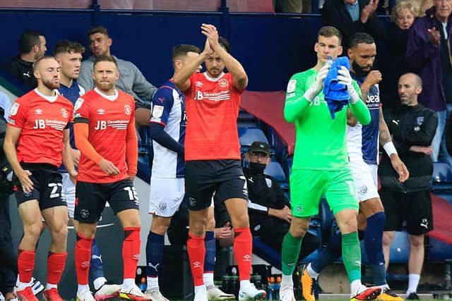 Town's players applaud their supporters before today's clash at West Bromwich Albion