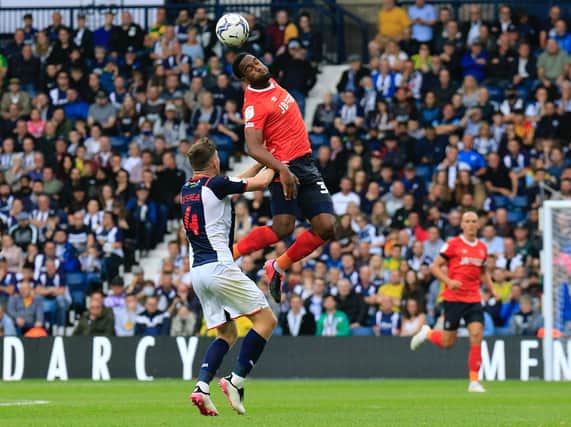 Cameron Jerome flicks the ball on against West Bromwich Albion on Saturday
