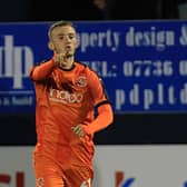 Town midfielder Jake Peck