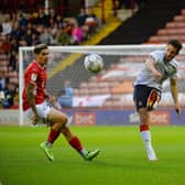 Tom Lockyer clears the danger against Barnsley in Luton's 1-0 victory