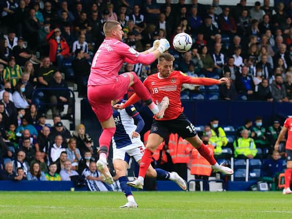 Jordan Clark collides with Sam Johnstone during his side's 3-2 defeat at West Bromwich Albion recently