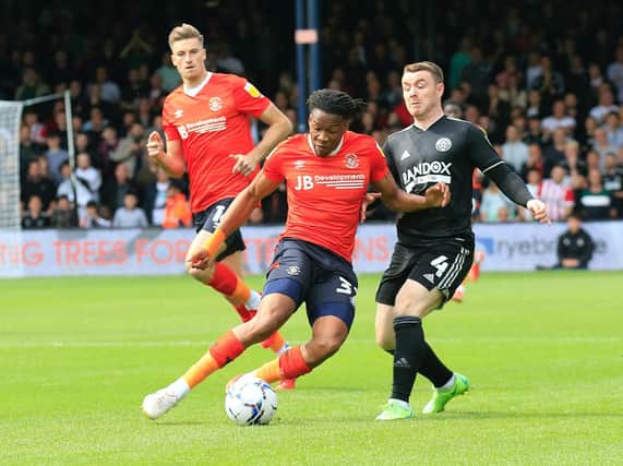 Gabe Osho makes a challenge against Sheffield United this afternoon