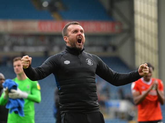 Town boss Nathan Jones celebrates his side's 2-2 draw at Blackburn