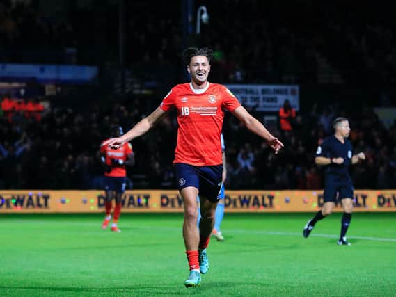 Harry Cornick celebrates scoring his second goal for the Hatters against Coventry