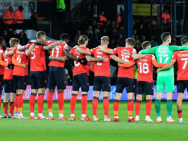 Luton players line up ahead of kick-off at the match with Coventry on Wednesday