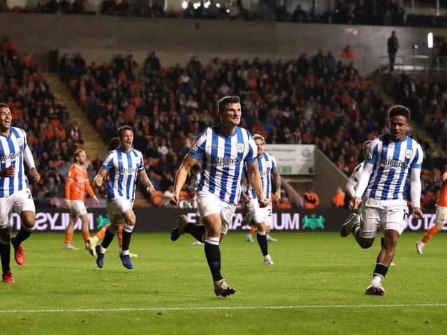 Matty Pearson celebrates scoring for Huddersfield this season