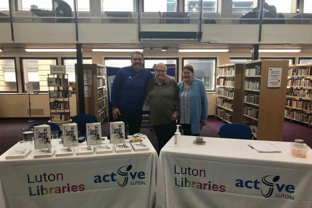 John with son Paul and daughter Debbie at the book signing held at Luton Central Library