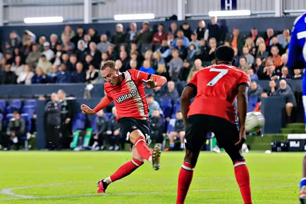 ​Cauley Woodrow fires home his first goal of the season against Gillingham on Tuesday night - pic: Liam Smith