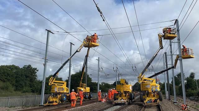 Engineers installing new overhead lines on the Midland Main Line. Picture: Network Rail