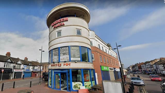The man fell from a balcony above the Coffee Pot in Dunstable Road
