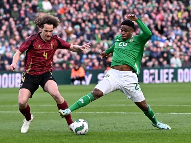 Chiedozie Ogbene gets to the ball ahead of Belgium's Wout Faes in Dublin on Saturday - pic: Charles McQuillan/Getty Images
