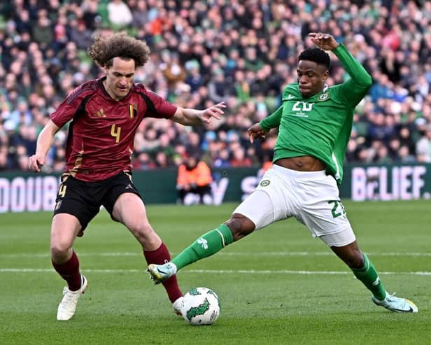 Chiedozie Ogbene gets to the ball ahead of Belgium's Wout Faes in Dublin on Saturday - pic: Charles McQuillan/Getty Images