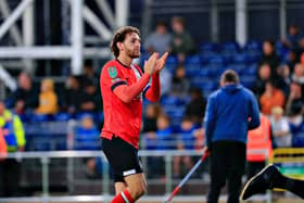 Tom Lockyer applauds the Hatters faithful during last night's victory over Gillingham - pic: Liam Smith