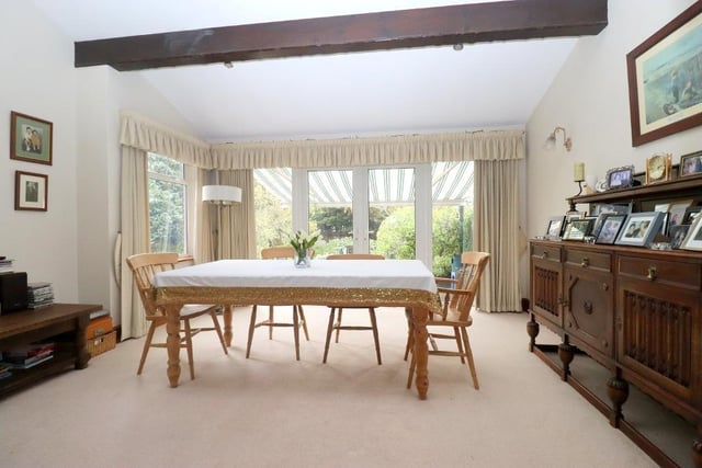 Following on from the second living space, this dining room features french doors that lead in to the garden.