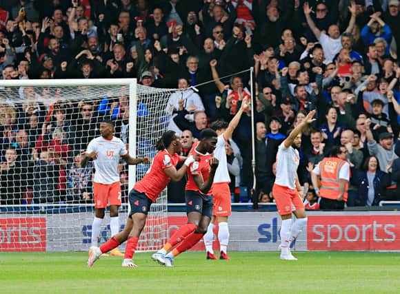 Elijah Adebayo opens the scoring for Luton against Blackpool